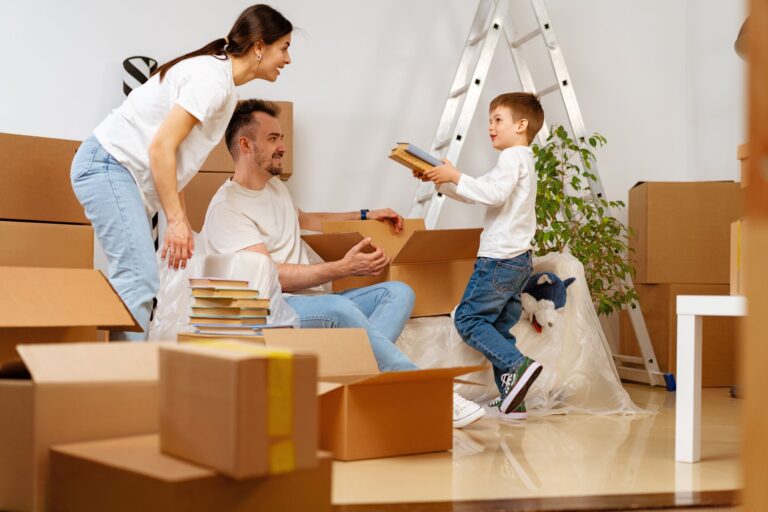 Parents and son packing for the house move