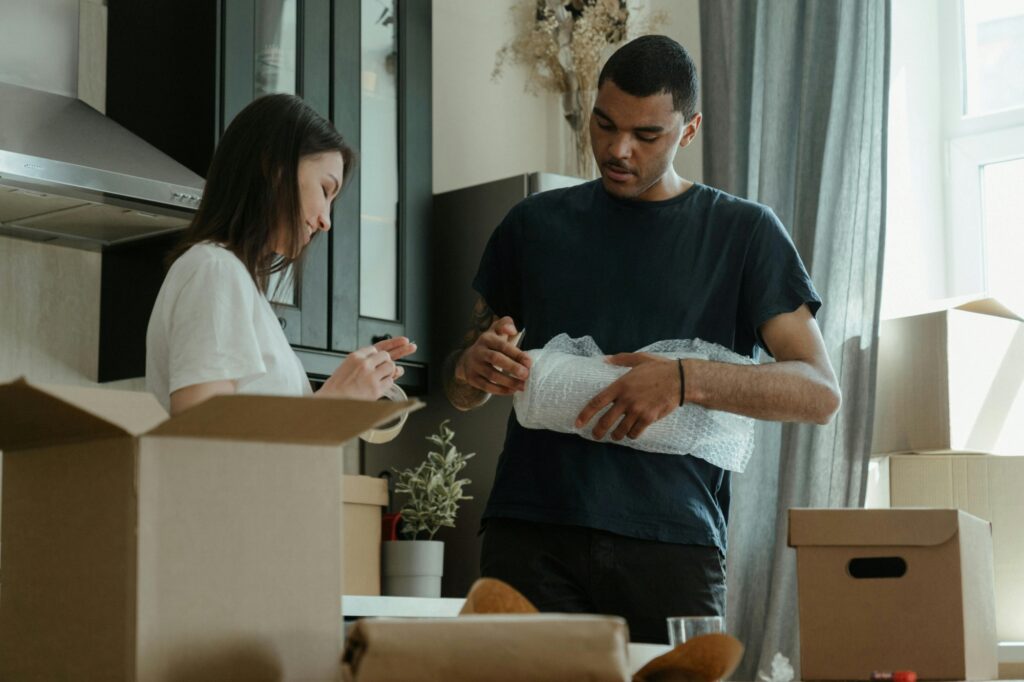 A couple has started packing their belongings for a house move