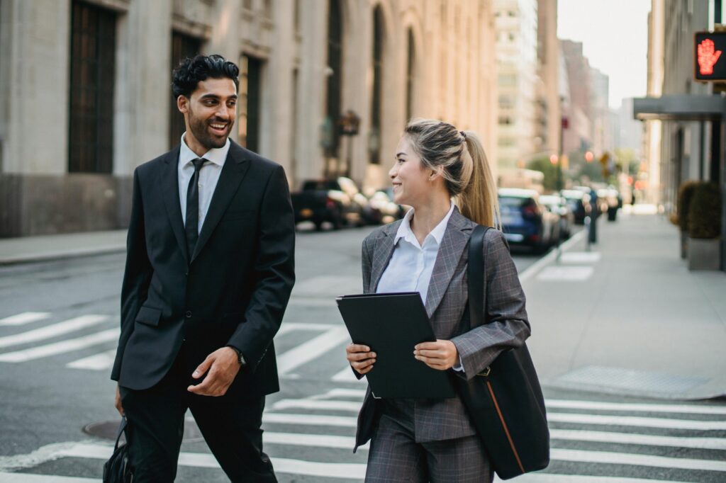 Office workers walking toward the office